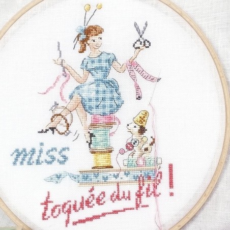 Grille : Miss «Toquée du fil »