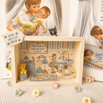 Aïda : La vitrine «Le petit monde de bébé» version Bleue